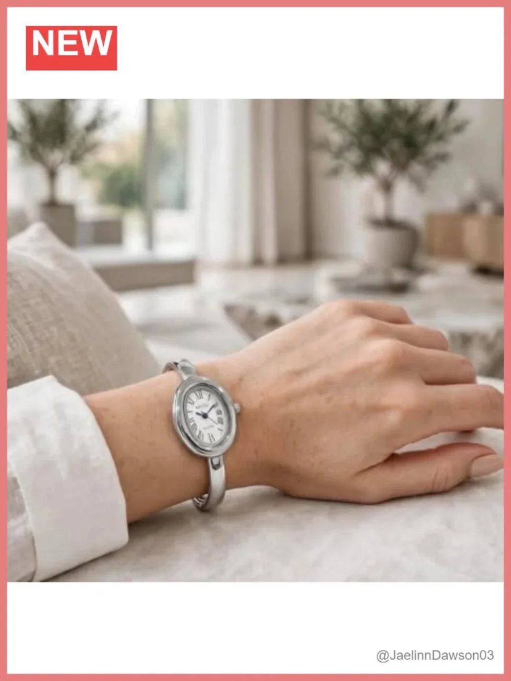 Elegant Gold-Tone Stainless Steel Bangle Watch with Oval Roman Numeral Dial